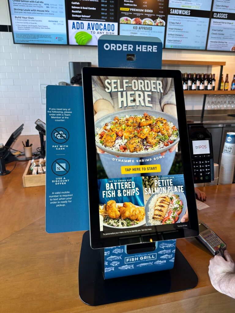 A self-order kiosk at Fish Grill restaurant